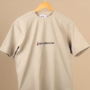 Beige T-shirt with black embroidery and pink flower